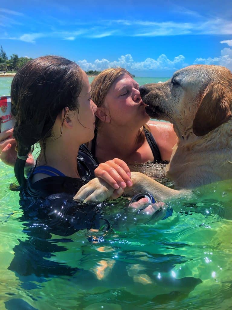 Sadie, Heid and Ganesh playing in water at Cozumel Pearl Farm