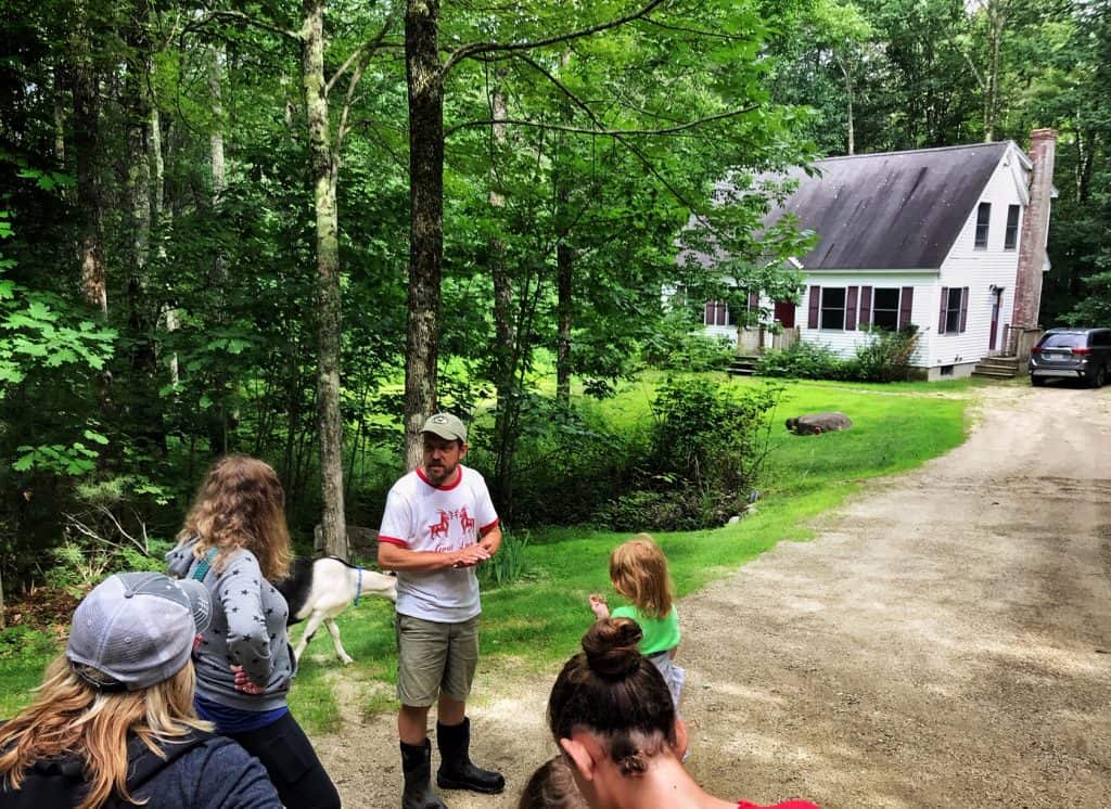 Karl Schatz in front of guesthouse at Ten Apple Farm