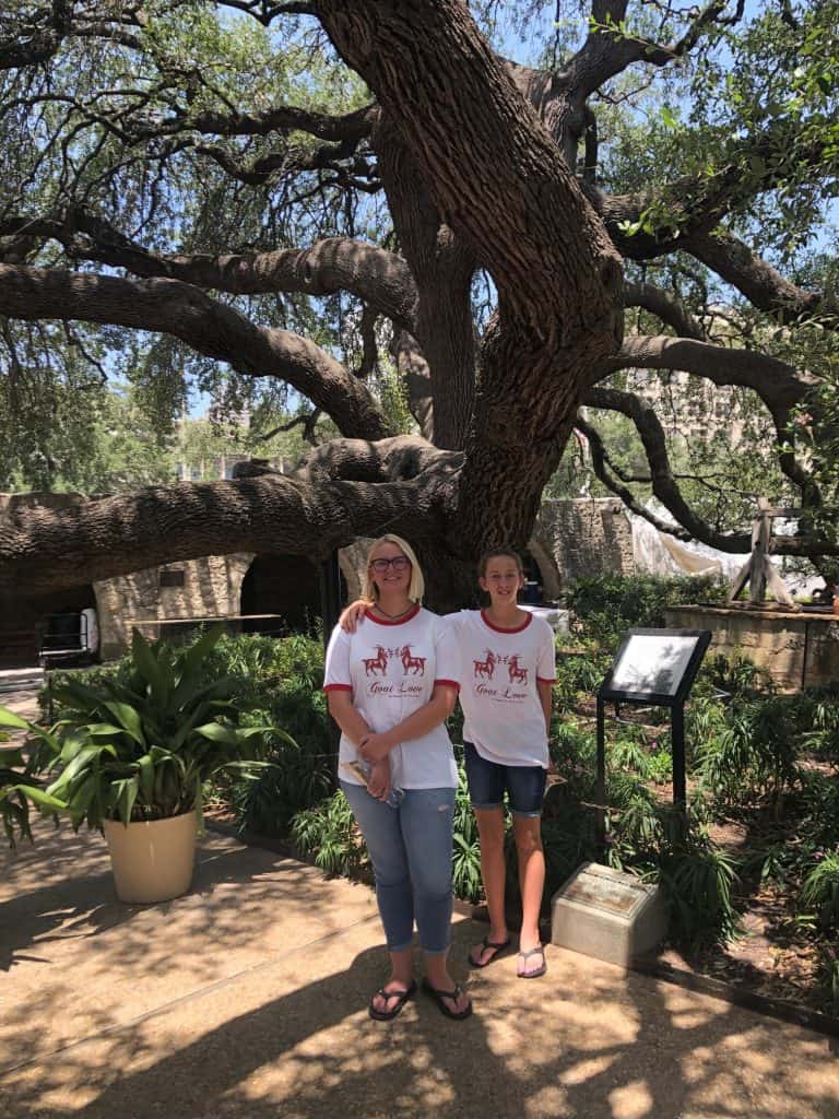Girls in Ten Apple Farm shirts at the Alamo