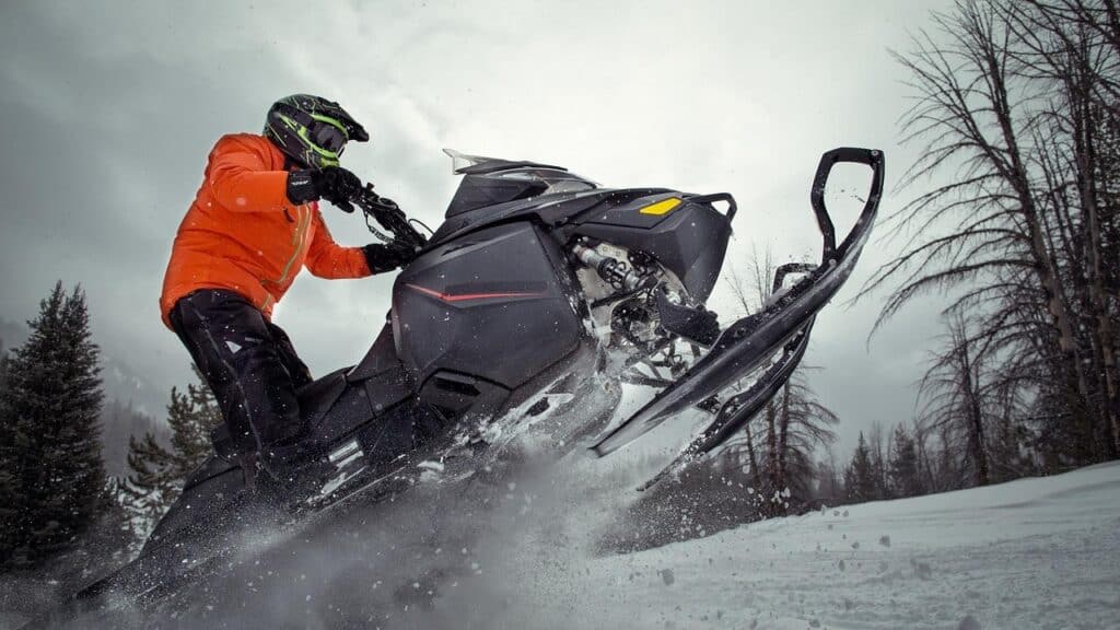 Maine Snowmobile Riding on Trail